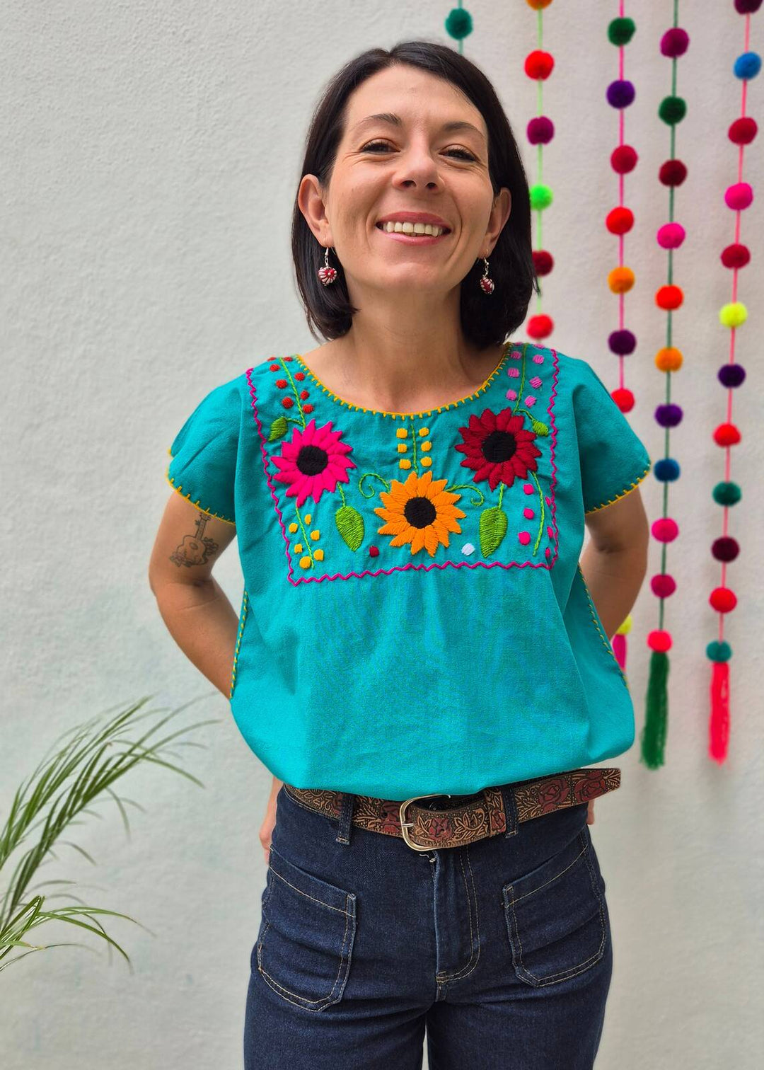 Blusa turquesa bordada